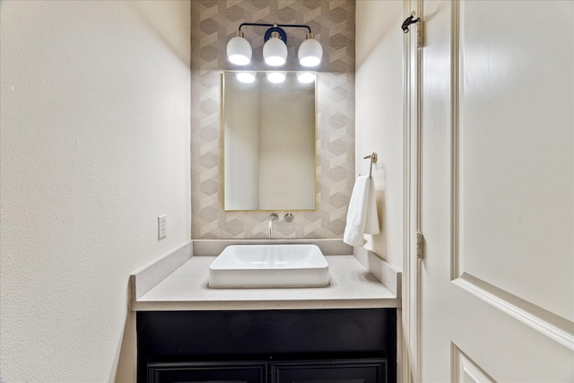 614 W Bell St Unit A, Houston, TX 77019 - bathroom with vanity and a textured wall