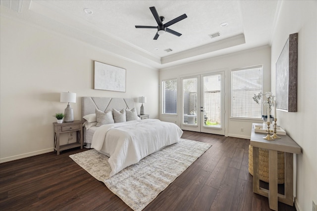 614 W Bell St Unit A, Houston, TX 77019 - bedroom with a raised ceiling, access to outside, baseboards, dark wood-style flooring, and ornamental molding