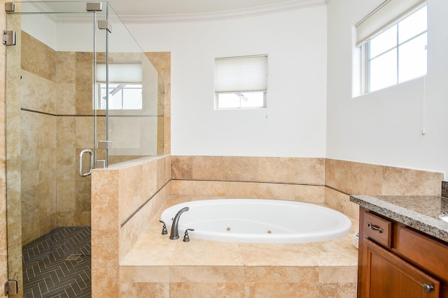 4006 Feagan St Unit D, Houston, TX 77007 - bathroom featuring a whirlpool tub, vanity, a shower stall, and ornamental molding