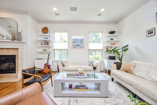 4006 Feagan St Unit D, Houston, TX 77007 - living room with wood finished floors, a fireplace, crown molding, and recessed lighting