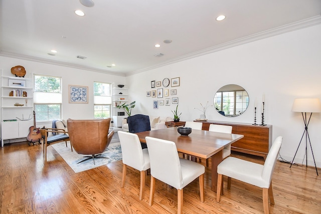4006 Feagan St Unit D, Houston, TX 77007 - dining space with ornamental molding, recessed lighting, and light wood-style flooring