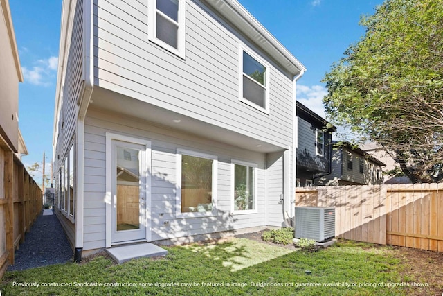 222 E 27th St, Houston, TX 77008 - rear view of house with central AC