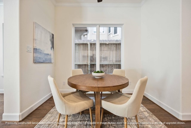 222 E 27th St, Houston, TX 77008 - dining room with crown molding, baseboards, and wood finished floors