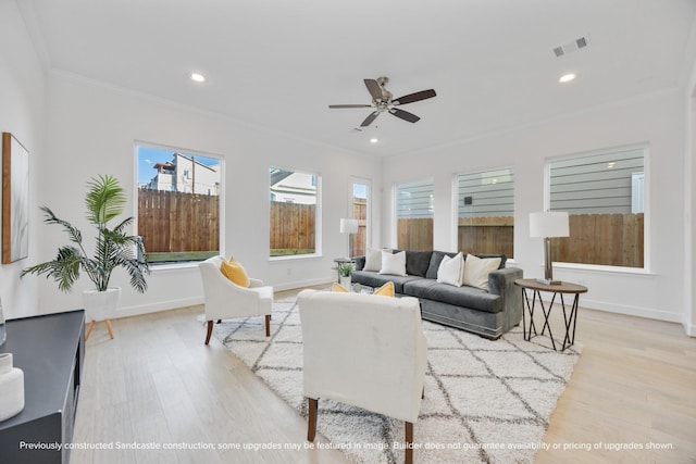 222 E 27th St, Houston, TX 77008 - living area with wood finished floors, crown molding, a ceiling fan, recessed lighting, and baseboards