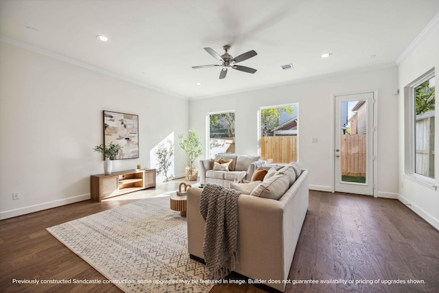 222 E 27th St, Houston, TX 77008 - living area featuring crown molding, healthy amount of natural light, dark wood-style flooring, a ceiling fan, and recessed lighting