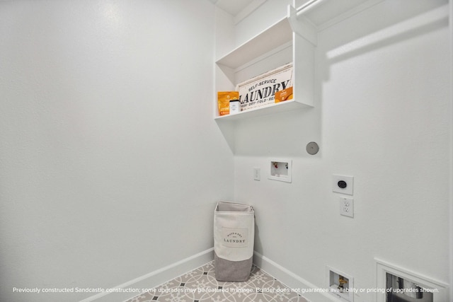 222 E 27th St, Houston, TX 77008 - washroom with washer hookup, hookup for an electric dryer, baseboards, and tile patterned flooring