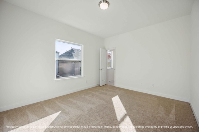 222 E 27th St, Houston, TX 77008 - empty room with light colored carpet and baseboards