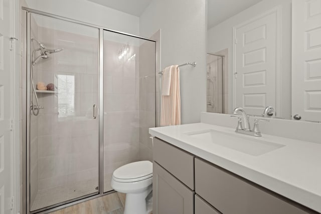7314 Autumn Sage Dr, Katy, TX 77493 - bathroom with a shower stall, toilet, and vanity
