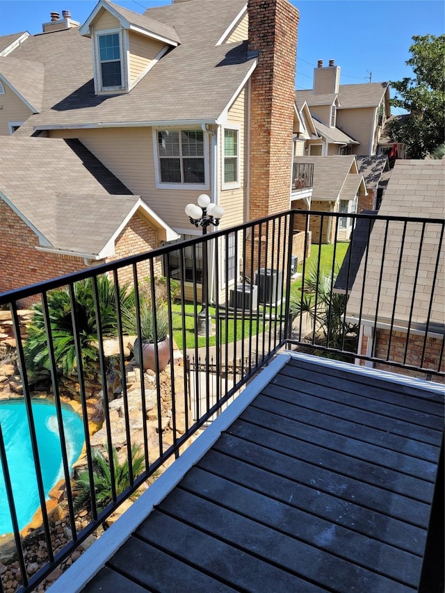 2300 Old Spanish Trl Unit 2136, Houston, TX 77054 - wooden deck with a residential view and an outdoor pool