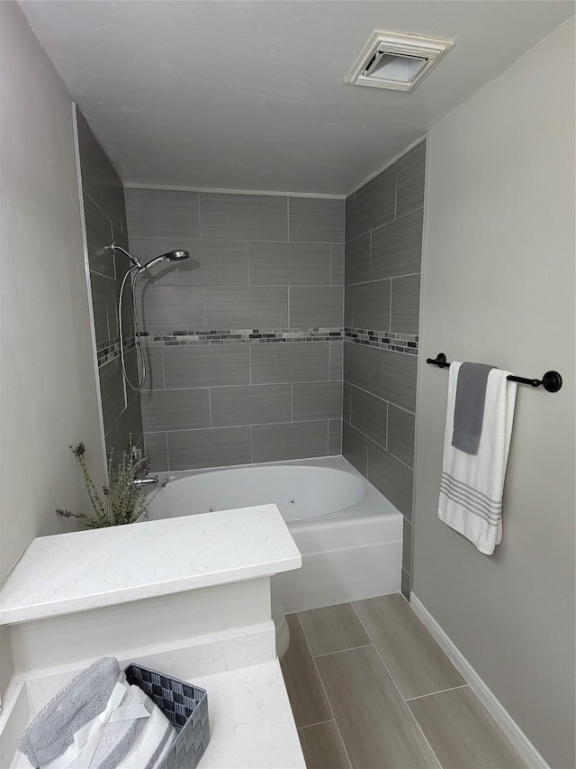 2300 Old Spanish Trl Unit 2136, Houston, TX 77054 - full bath featuring baseboards and tub / shower combination