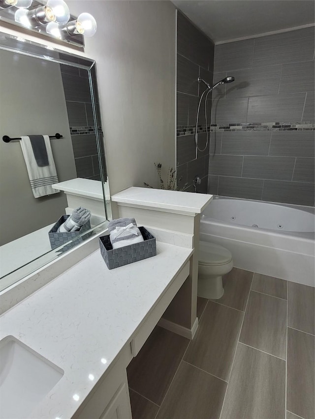 2300 Old Spanish Trl Unit 2136, Houston, TX 77054 - bathroom with bathing tub / shower combination, toilet, and vanity