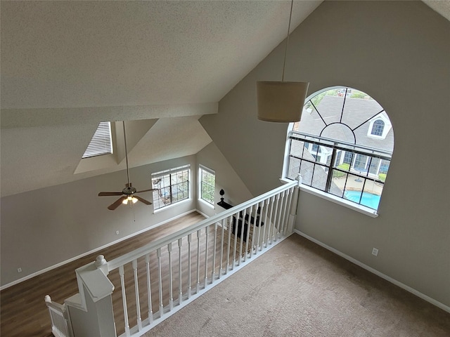 2300 Old Spanish Trl Unit 2136, Houston, TX 77054 - stairway with lofted ceiling, baseboards, ceiling fan, and carpet flooring