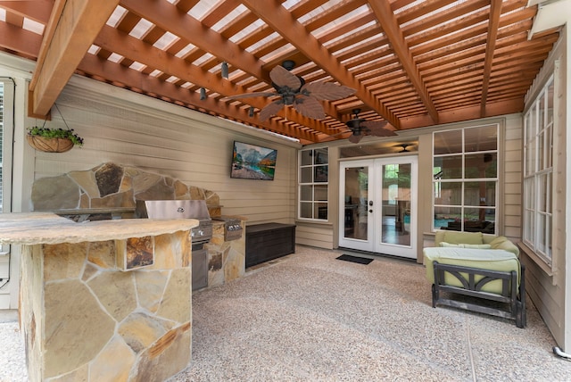 37 S Piney Plains Cir, The Woodlands, TX 77382 - view of patio / terrace featuring french doors, exterior kitchen, a ceiling fan, and a pergola