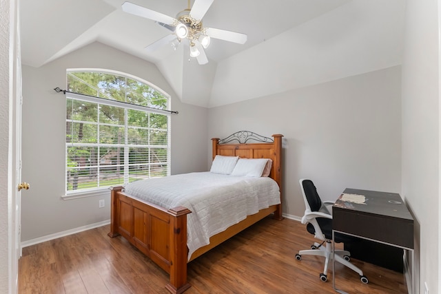 37 S Piney Plains Cir, The Woodlands, TX 77382 - bedroom featuring vaulted ceiling, multiple windows, wood finished floors, baseboards, and an office area