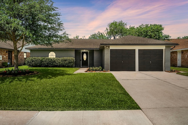 11243 Rousseau Dr, Houston, TX 77065 - view of front of property with a garage, brick siding, concrete driveway, a front yard, and a shingled roof
