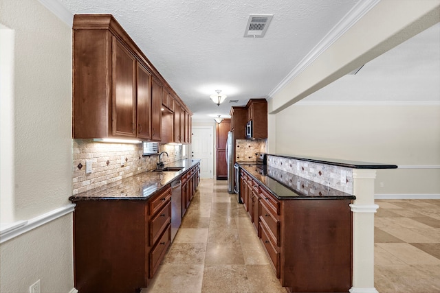 11243 Rousseau Dr, Houston, TX 77065 - kitchen featuring appliances with stainless steel finishes, backsplash, a sink, dark stone counters, and ornamental molding