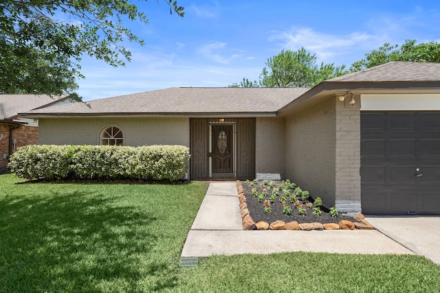 11243 Rousseau Dr, Houston, TX 77065 - view of front of home featuring brick siding, an attached garage, a front lawn, and roof with shingles