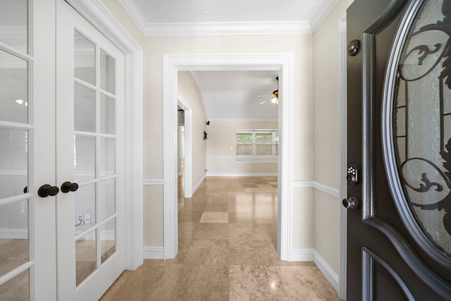 11243 Rousseau Dr, Houston, TX 77065 - hallway featuring french doors, baseboards, and crown molding