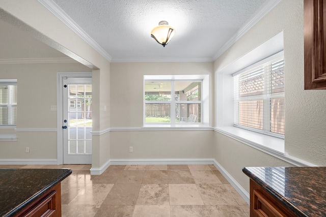 11243 Rousseau Dr, Houston, TX 77065 - unfurnished dining area with plenty of natural light, crown molding, a textured ceiling, and baseboards