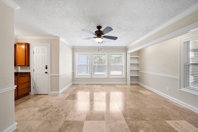 11243 Rousseau Dr, Houston, TX 77065 - spare room featuring ceiling fan, crown molding, a textured ceiling, and baseboards