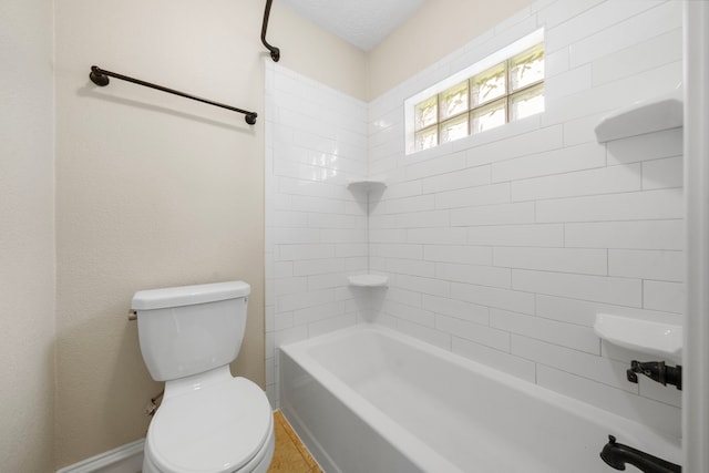 11243 Rousseau Dr, Houston, TX 77065 - bathroom featuring toilet and shower / bath combination