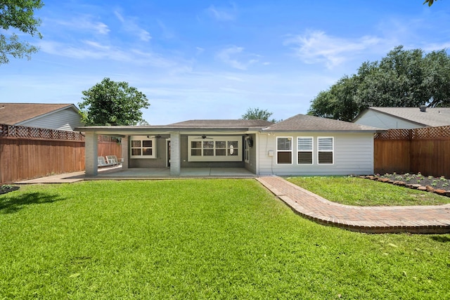 11243 Rousseau Dr, Houston, TX 77065 - back of property with a ceiling fan and a patio