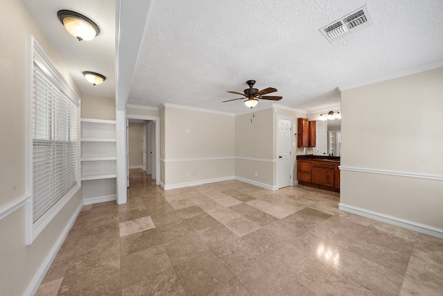 11243 Rousseau Dr, Houston, TX 77065 - unfurnished room featuring a ceiling fan, baseboards, crown molding, and a textured ceiling