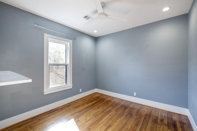 1016 Louise St, Houston, TX 77009 - empty room featuring ceiling fan, baseboards, wood finished floors, and recessed lighting