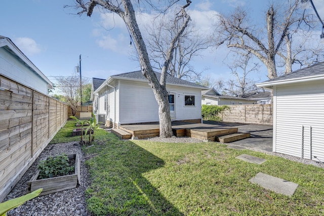 1016 Louise St, Houston, TX 77009 - view of yard featuring a garden and a deck