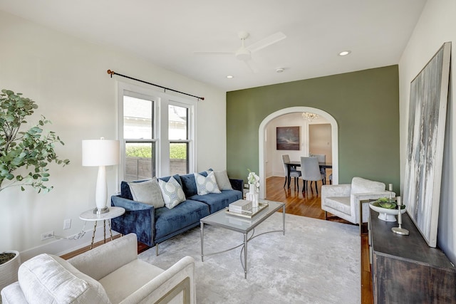 1016 Louise St, Houston, TX 77009 - living area featuring arched walkways, wood finished floors, ceiling fan, and recessed lighting