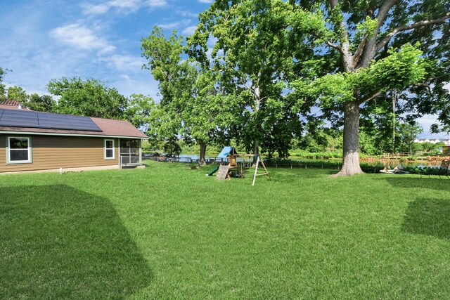5103 Diamond Springs Dr, Missouri City, TX 77459 - view of green lawn with a playground