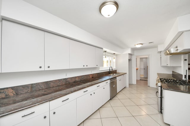 5103 Diamond Springs Dr, Missouri City, TX 77459 - kitchen with a sink, stainless steel appliances, and white cabinetry