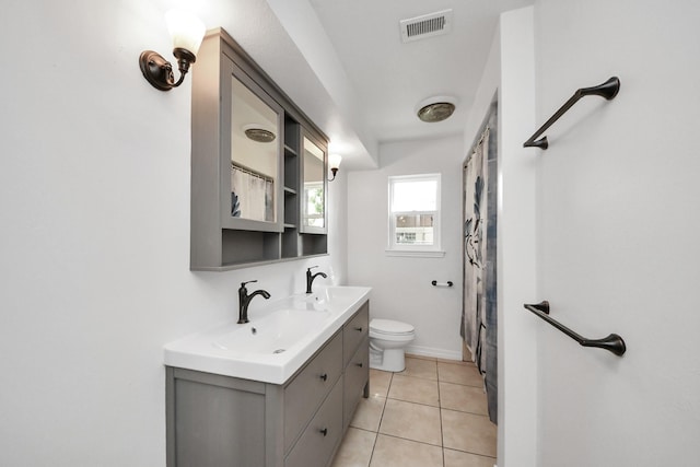 5103 Diamond Springs Dr, Missouri City, TX 77459 - bathroom with toilet, vanity, tile patterned floors, and a shower with curtain