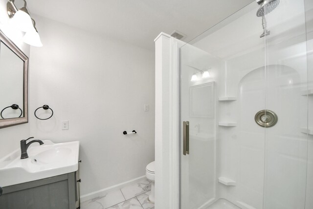 5103 Diamond Springs Dr, Missouri City, TX 77459 - full bath featuring marble finish floors, a stall shower, toilet, vanity, and baseboards
