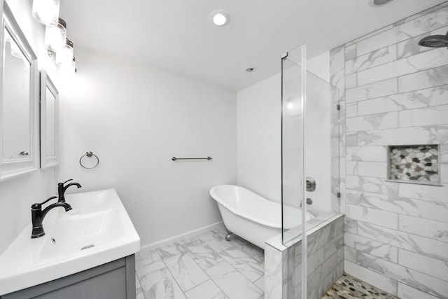 5103 Diamond Springs Dr, Missouri City, TX 77459 - bathroom featuring marble look tile flooring, a tile shower, a freestanding tub, recessed lighting, and double vanity