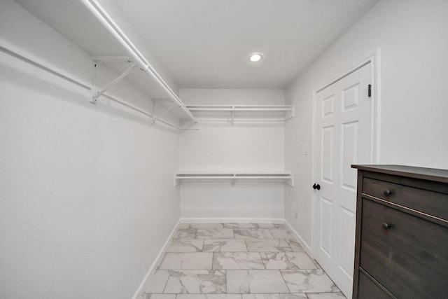 5103 Diamond Springs Dr, Missouri City, TX 77459 - spacious closet with light marble finish flooring