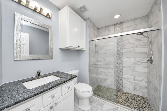 5103 Diamond Springs Dr, Missouri City, TX 77459 - bathroom with marble finish flooring, a shower stall, toilet, recessed lighting, and vanity