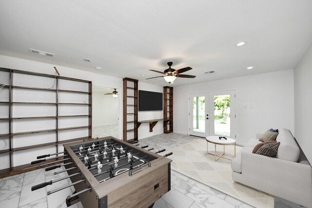5103 Diamond Springs Dr, Missouri City, TX 77459 - game room with light marble finish flooring, recessed lighting, and ceiling fan