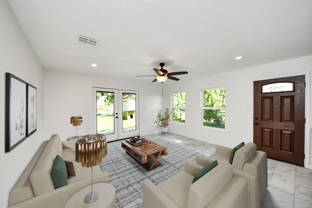 5103 Diamond Springs Dr, Missouri City, TX 77459 - living room with light marble finish flooring, recessed lighting, and ceiling fan