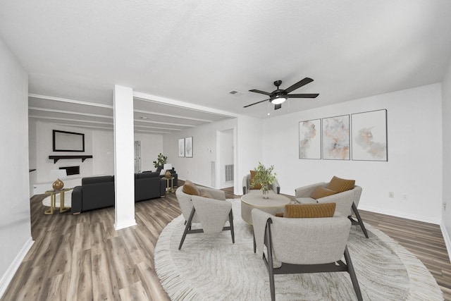 5103 Diamond Springs Dr, Missouri City, TX 77459 - living area featuring wood finished floors, baseboards, and a ceiling fan