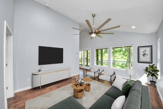 5103 Diamond Springs Dr, Missouri City, TX 77459 - living room featuring wood finished floors, a ceiling fan, high vaulted ceiling, baseboards, and recessed lighting