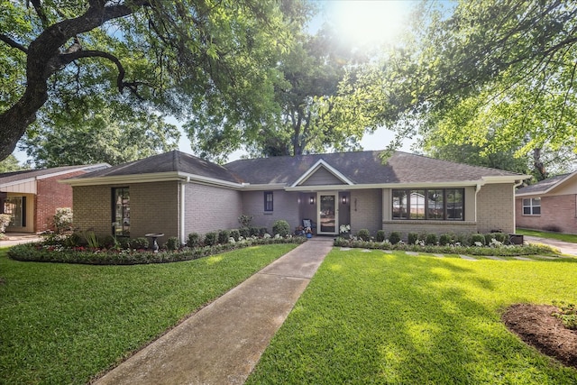 2514 Briarbrook Dr, Houston, TX 77042 - ranch-style home featuring brick siding and a front lawn