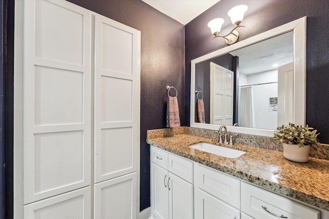 2514 Briarbrook Dr, Houston, TX 77042 - bathroom with a textured wall and vanity