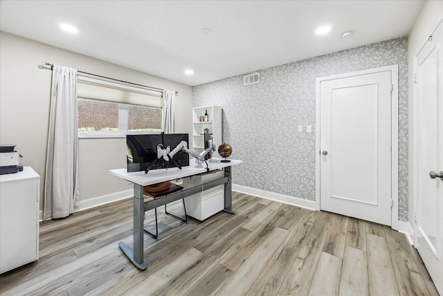 2514 Briarbrook Dr, Houston, TX 77042 - office space featuring wallpapered walls, light wood-style flooring, recessed lighting, and baseboards