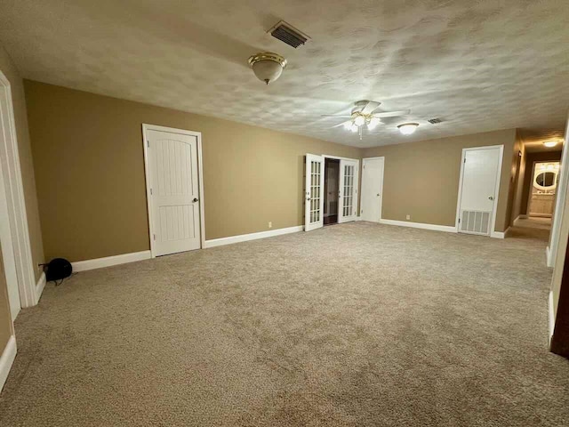 207 Lucky Dr, Silsbee, TX 77656 - spare room featuring baseboards, a ceiling fan, and carpet floors