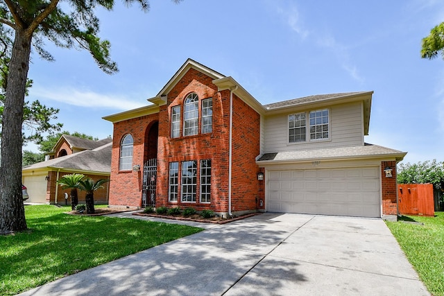 11707 Turtle Lake Dr, Houston, TX 77064 - view of front facade with a garage, brick siding, and concrete driveway