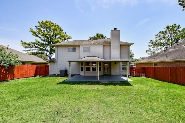 11707 Turtle Lake Dr, Houston, TX 77064 - back of property with a patio, a chimney, and central AC