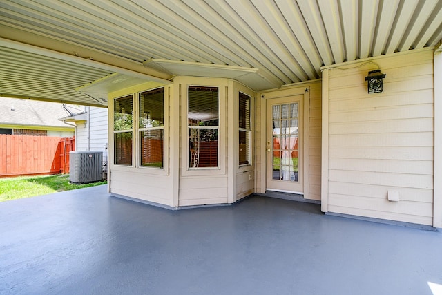 11707 Turtle Lake Dr, Houston, TX 77064 - view of patio / terrace with central air condition unit and fence