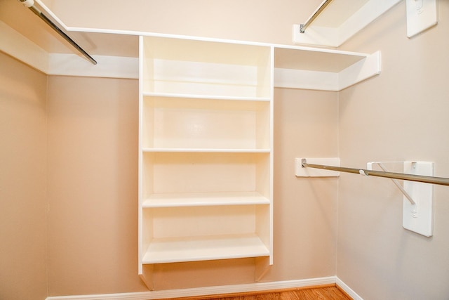 11707 Turtle Lake Dr, Houston, TX 77064 - walk in closet with wood finished floors