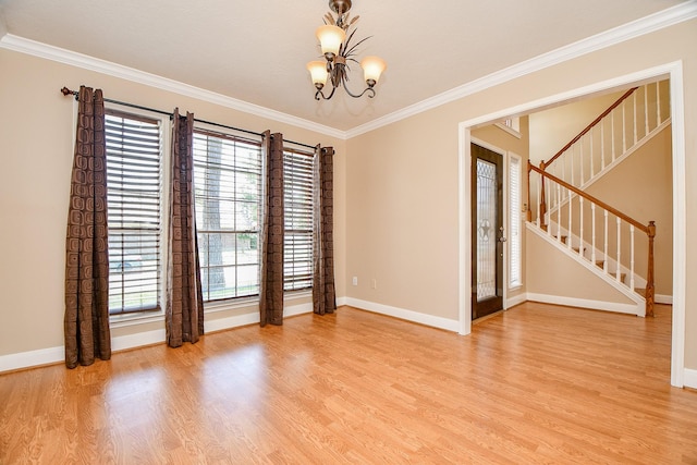 11707 Turtle Lake Dr, Houston, TX 77064 - empty room with a chandelier, light wood-type flooring, baseboards, and ornamental molding